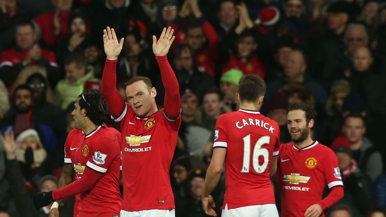 Wayne Rooney celebrates scoring during Premier League match between Manchester United and Newcastle United at Old Trafford on December 26, 2014