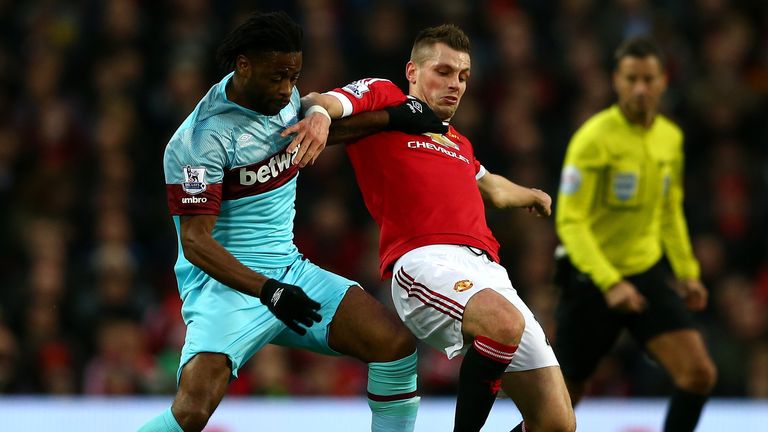 Morgan Schneiderlin holds off Alex Song