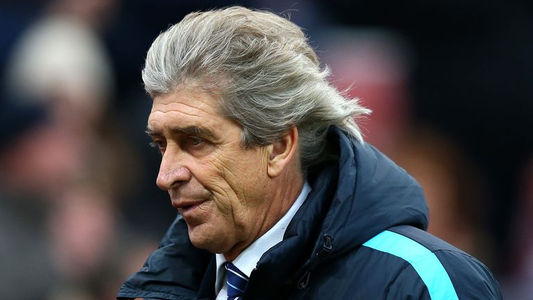 STOKE ON TRENT, ENGLAND - DECEMBER 05:  Manuel Pellegrini, manager of Manchester City shows his dejection after the Barclays Premier League match between S