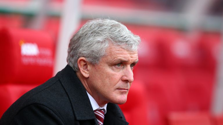 Mark Hughes looks on prior to the Barclays Premier League match between Stoke City and Manchester City