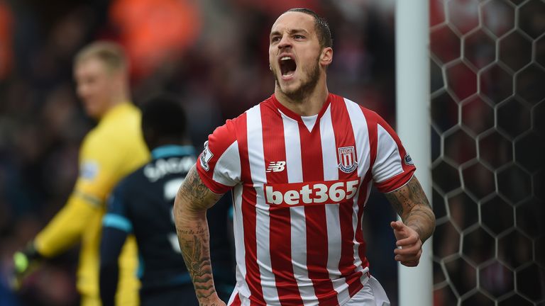 Marko Arnautovic celebrates after scoring during the match between Stoke City and Manchester City