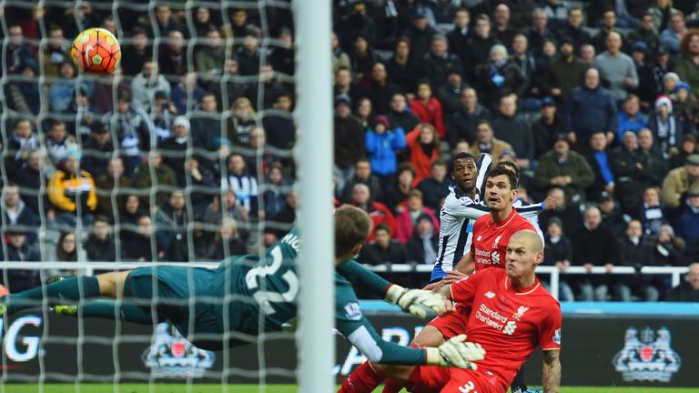 Martin Skrtel deflects Georginio Wijnaldum's shot into his own net