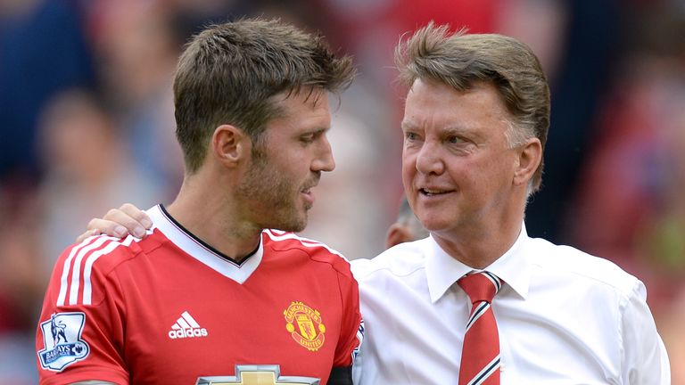 Manchester United manager Louis van Gaal with Michael Carrick