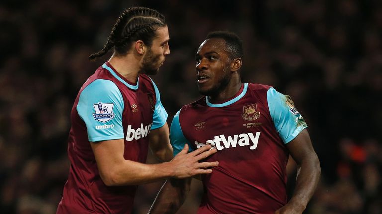 Michail Antonio celebrates with Andy Carroll