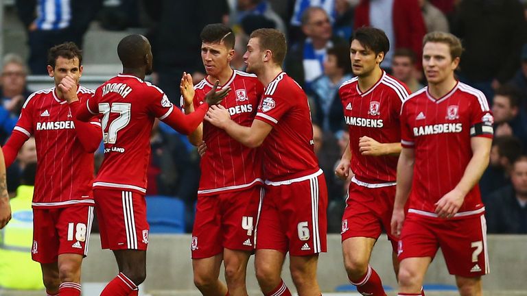 Albert Adomah of Middlesbrough celebrates with Daniel Ayalaand team-mates