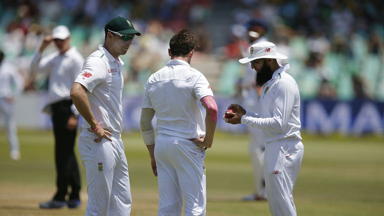 Morne Morkel, Dale Steyn and Hashim Amla consult on day three in Durban