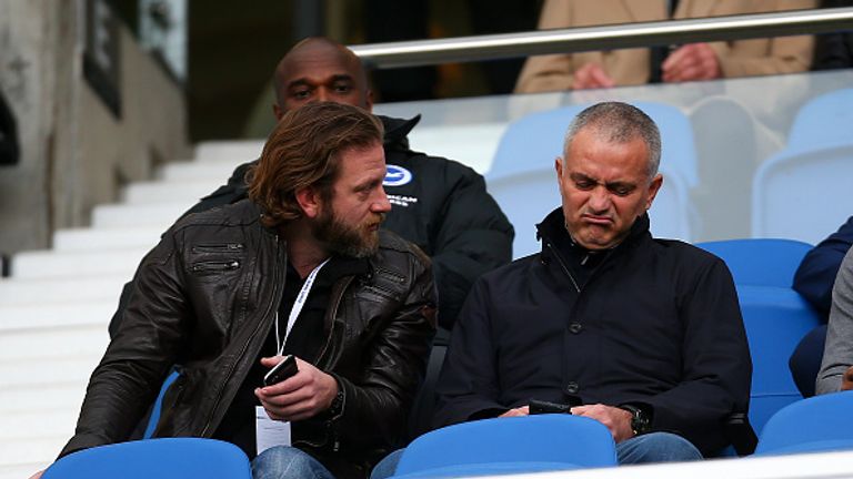 Jose Mourinho (right) watches on at Brighton
