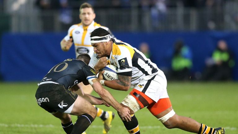 Nathan Hughes of Wasps takes on George Ford  during the Champions Cup match between Bath and Wasps at the Recreation Ground 