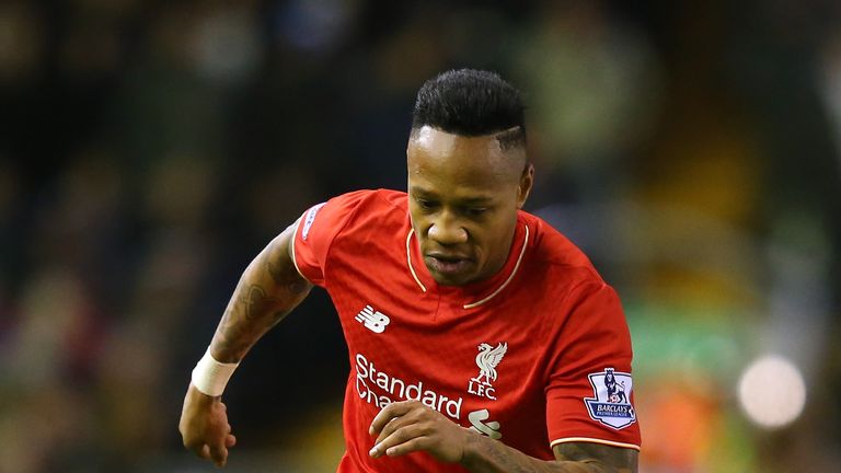 Nathaniel Clyne of Liverpool runs with the ball during the Barclays Premier League match against Swansea City