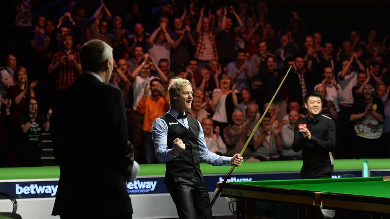 Neil Robertson celebrates scoring a maximum 147 break in the UK Championship final against Liang Wenbo