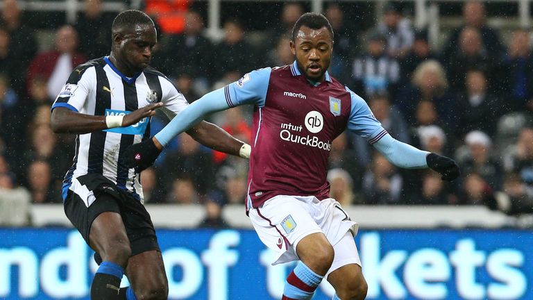 Jordan Ayew of Aston Villa and Moussa Sissoko of Newcastle