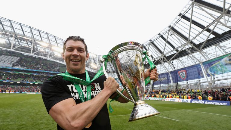 Nick Kennedy of Toulon holds the trophy after their victory during the Heineken Cup final match between ASM Clermont Auvergne and Toulon