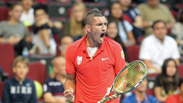 Australia's Nick Kyrgios of the Singapore Slammers celebrates after a point against Germany's Philipp Kohlschreiber of the Japan Warriors 