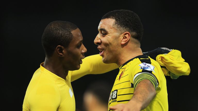 WATFORD, ENGLAND - DECEMBER 05:  Odion Ighalo (L) of Watford celebrates scoring his team's second goal with his team mate Troy Deeney (R) during the Barcla