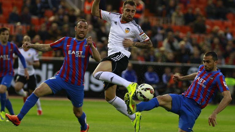 Valencia's Paco Alcacer in action against Levante last season