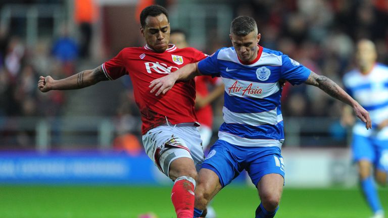 Paul Konchesky of Queens Park Rangers is tackled by Bristol City's Elliot Bennett