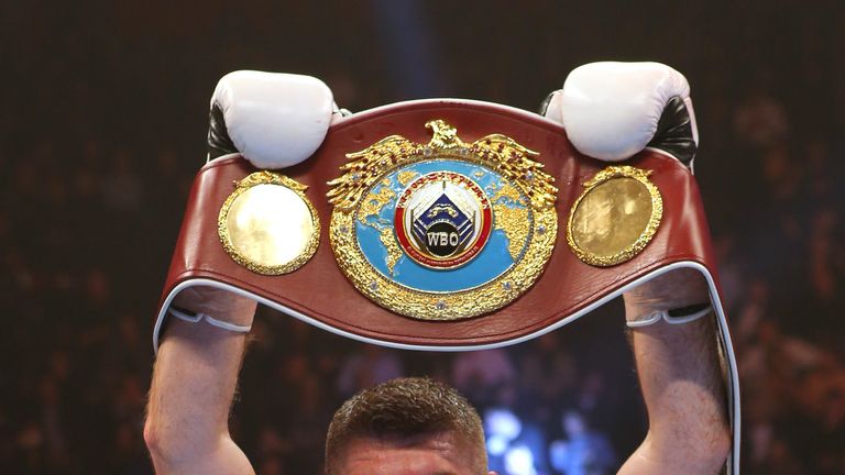 MANCHESTER, ENGLAND - DECEMBER 19: Liam Smith celebrates beating Jimmy Kelly during their WBO World Super Welterweight title fight at the Manchester Arena 