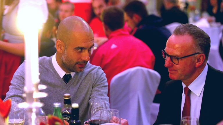 Karl-Heinz Rummenigge speaks with Pep Guardiola after Bayern Munich's Champions League clash against Dinamo Zagreb