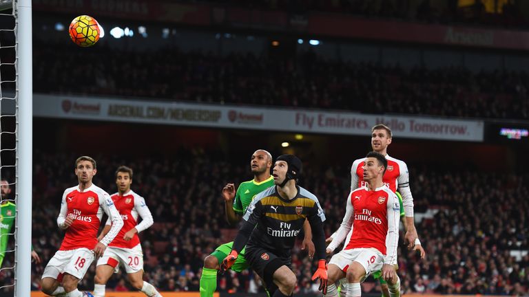 Arsenal goalkeeper Petr Cech watches as Olivier Giroud's own goal puts Sunderland level at 1-1