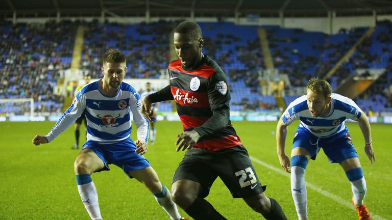 Junior Hoilett is watched by Oliver Norwood and Chris Gunter 