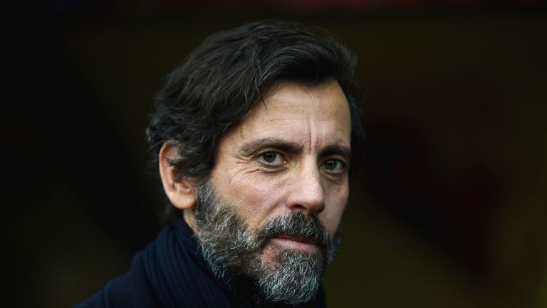 Quique Flores looks on prior to the Barclays Premier League match between Watford and Tottenham Hotspur