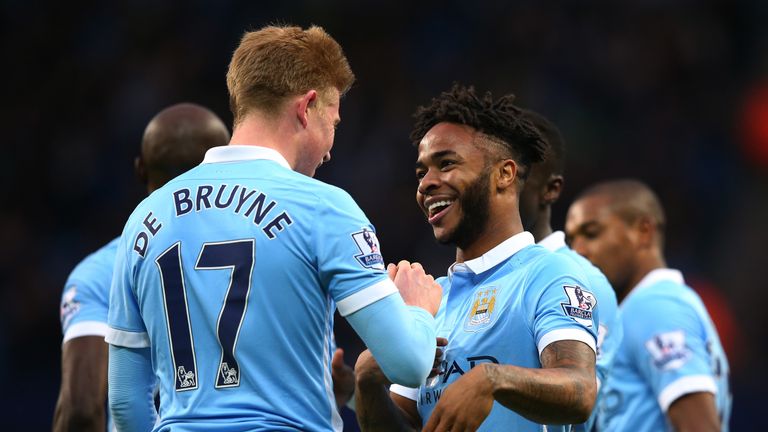 Raheem Sterling of Manchester City celebrates with Kevin De Bruyne after scoring the opening goal against Sunderland