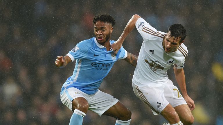Raheem Sterling keeps possession for Manchester City