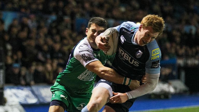 Cardiff Blues' Rhys Patchell is tackled by Connacht's Tiernan O'Halloran