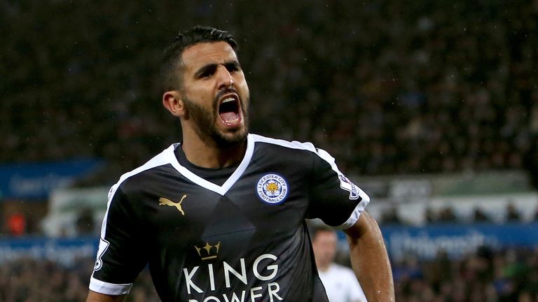 Riyad Mahrez celebrates after scoring his third goal during the English Premier League football match between Swansea City and Leicester City