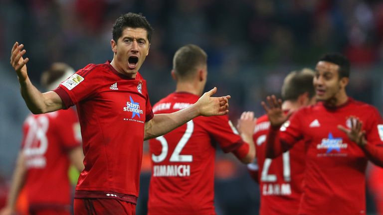 Robert Lewandowski celebrates after scoring for Bayerrn