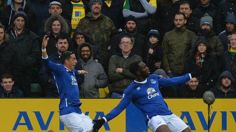 NORWICH, ENGLAND - DECEMBER 12: Romelu Lukaku (R) of Everton celebrates scoring his team's first goal with his team mate Ramiro Funes (L) during the Barcla