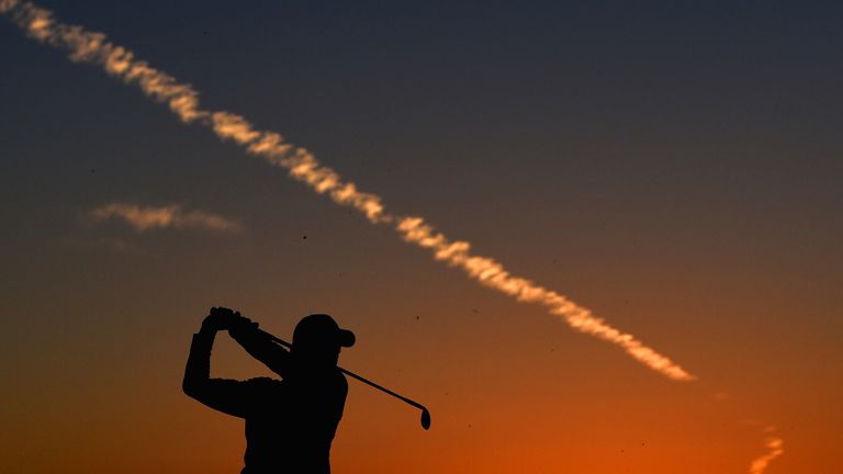 ABU DHABI, UNITED ARAB EMIRATES - JANUARY 15:  Rory McIlroy of Northern Ireland on the practice range during the first round of the Abu Dhabi HSBC Golf Cha