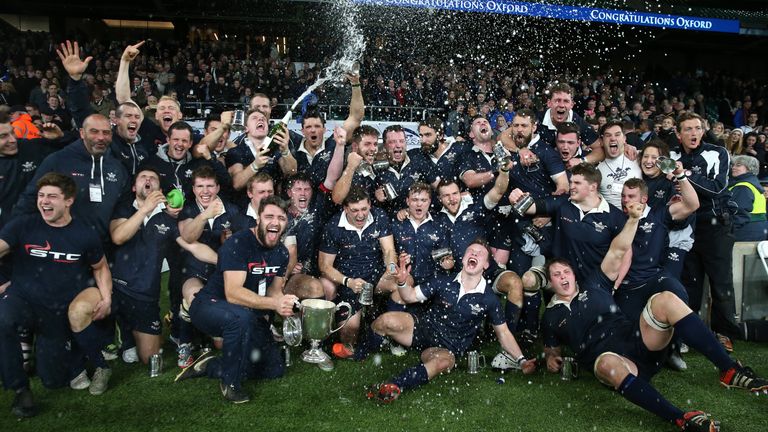 Oxford celebrate their victory over Cambridge in the Varsity match