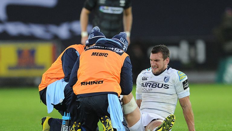 Sam Warburton receives treatment after injuring his ankle playing for Cardiff Blues against Ospreys