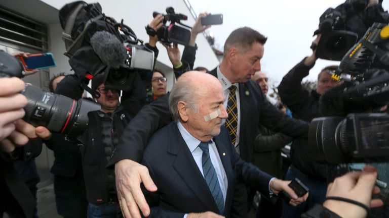 Sepp Blatter arrives at his news conference