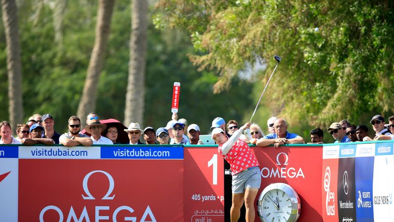 DUBAI, UNITED ARAB EMIRATES - DECEMBER 11:  Shanshan Feng of China plays her tee shot on the par 4, first hole during the third round of the 2015 Omega Dub
