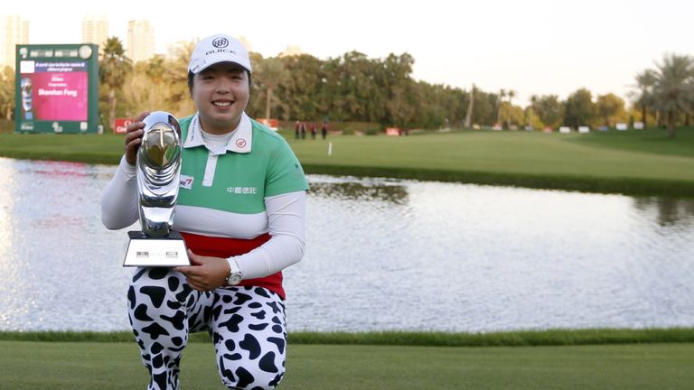 Shanshan Feng lifts the trophy for the third time in four years