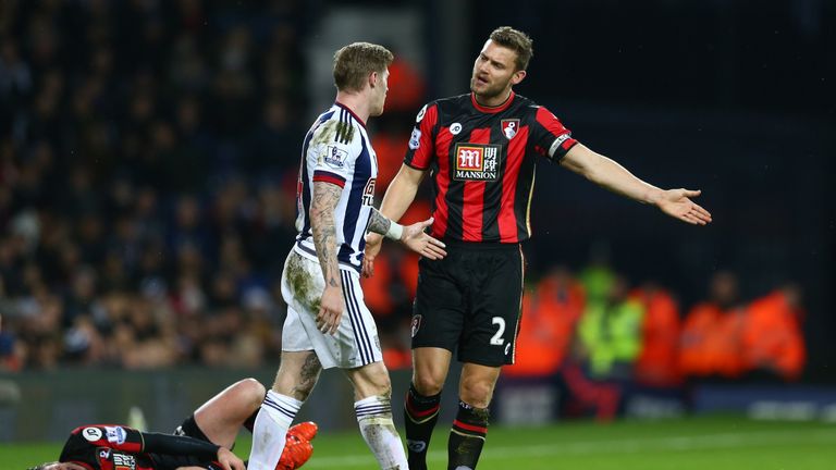 WEST BROMWICH, ENGLAND - DECEMBER 19:  Simon Francis (R) of Bournemouth argues with James McClean (C) of West Bromwich Albion after fouling on Adam Smith (
