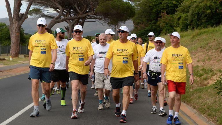 Sir Ian Botham and his supporters tackle an incline on day two