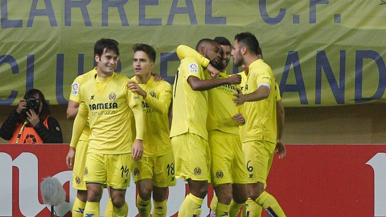 Villarreal's players celebrates their first goal against Real Madrid