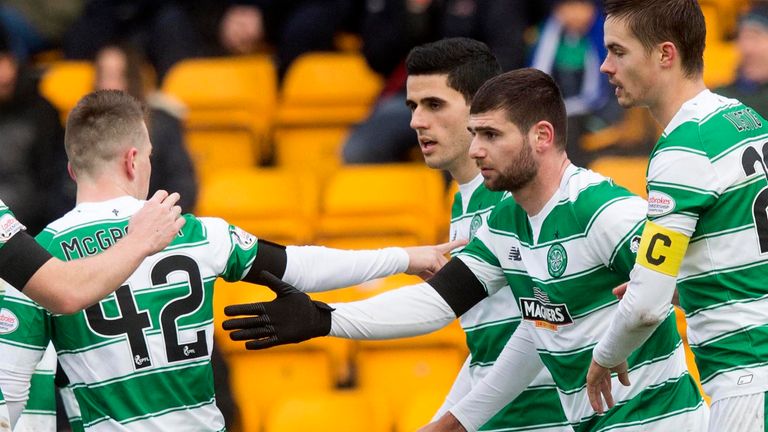 Celtic's Nadir Ciftci (second right) celebrates scoring his side's opeing goal against St Johnstone
