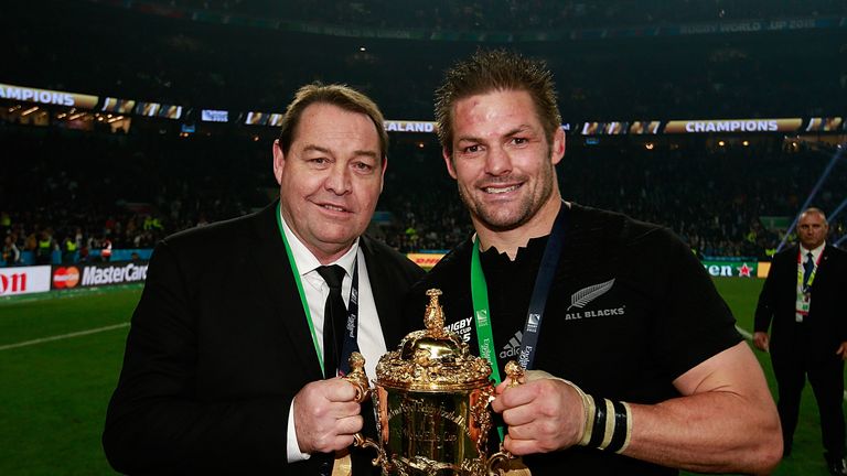 Steve Hansen the head coach of New Zealand and Richie McCaw of New Zealand pose with the Webb Ellis Cup after victory in the 2015 Rugby World Cup Final