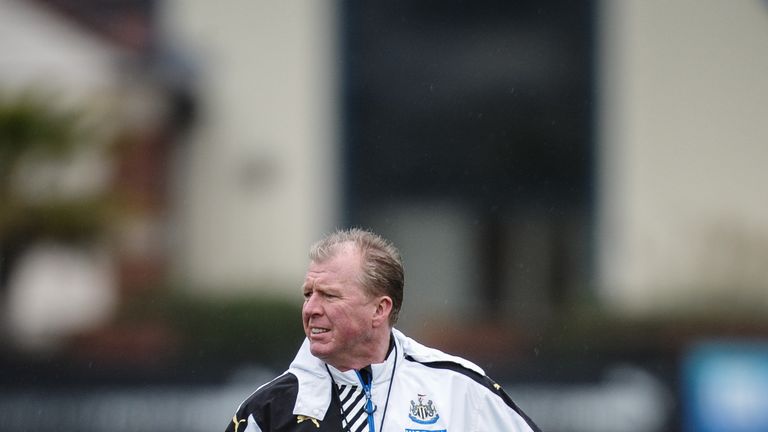 Head Coach Steve McClaren walks on the pitch with a ball under arm during the Newcastle United Training session