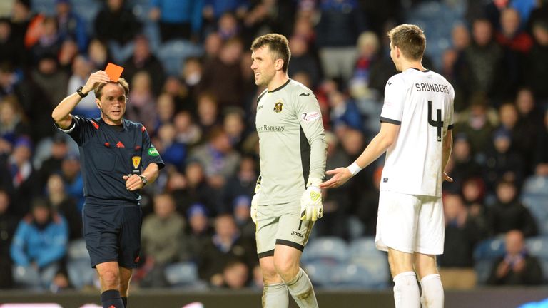 Dumbarton's Steven Saunders (right) is sent off in 4-0 defeat to Rangers at Ibrox