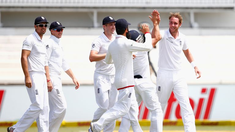 Stuart Broad of England is congratulated after Hashim Amla of South Africa was caught behind during day two of the 1st Test