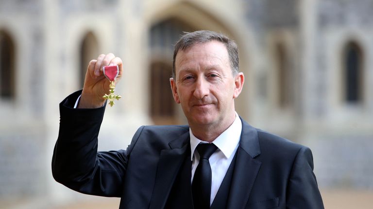 Swansea City chairman Huw Jenkins with his OBE