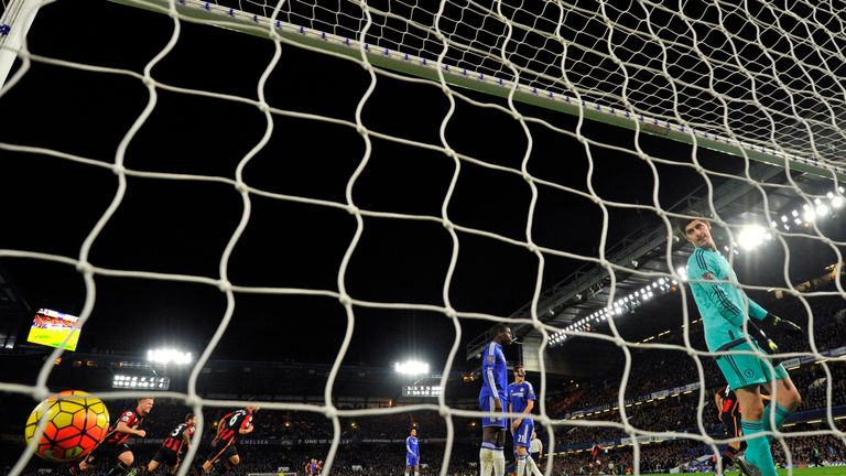 Chelsea goalkeeper Thibaut Courtois looks on after Bournemouth's Glenn Murray scores