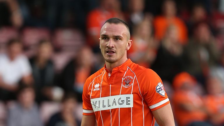  Tom Aldred of Blackpool in action