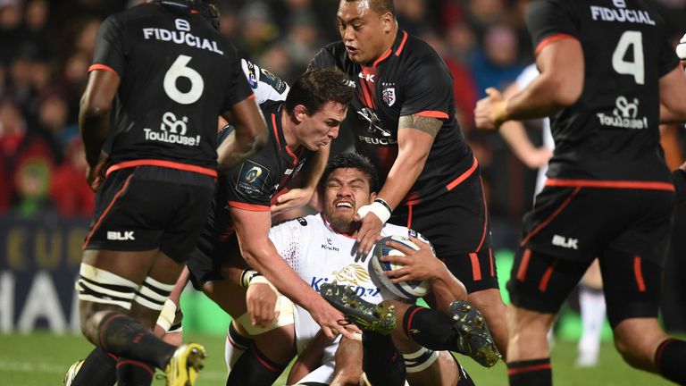 Nick Williams who scored Ulster's opening try is swamped  by the Toulouse defence 