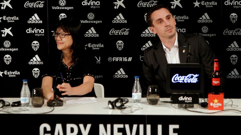 Valencia club chairwoman Lay Hoon Chan (L) and new head coach Gary Neville during his official presentation as the club's new coach at the Mestalla